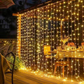 Dazzle Bright 300 LED Curtain Lights, Plug in Fairy Curtain Lights for Bedroom, Christmas Hanging String Lights Outdoor for Window Backdrop Wall Wedding Patio Indoor Dorm Party Decor, Warm White by DazzleBright